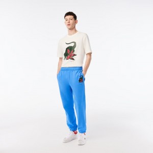 Men's Lacoste Lacoste x Netflix Croc Print Sweatpants Ethereal blue | OZI984103