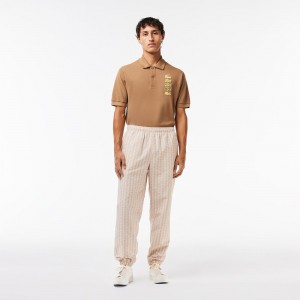 Men's Lacoste Monogram Print Sweatpants Beige White | BLU106749