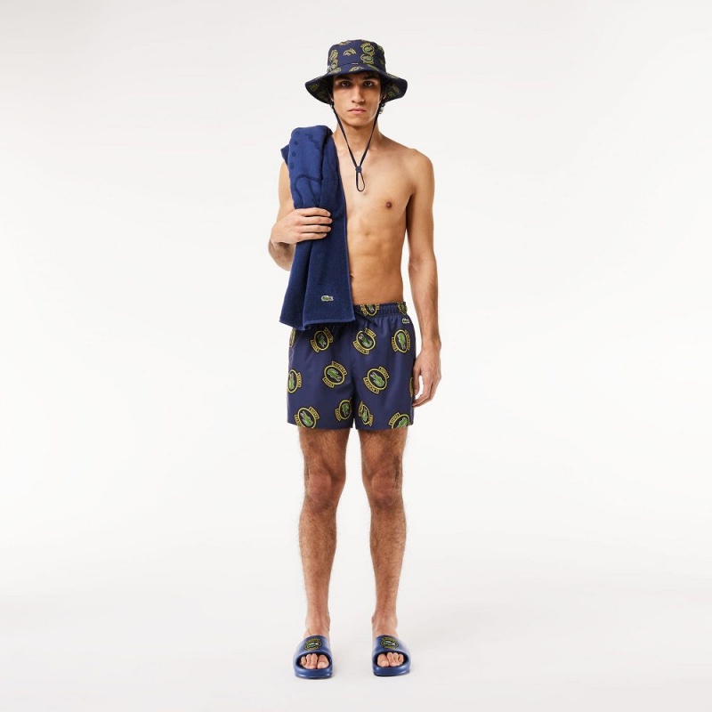 Men's Lacoste Logo Badge Swim Trunks Navy Blue Yellow | QGW871042