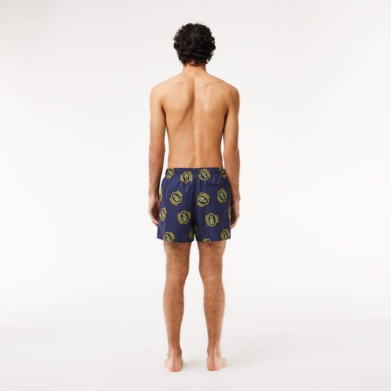 Men's Lacoste Logo Badge Swim Trunks Navy Blue Yellow | QGW871042