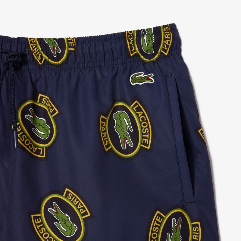 Men's Lacoste Logo Badge Swim Trunks Navy Blue Yellow | QGW871042