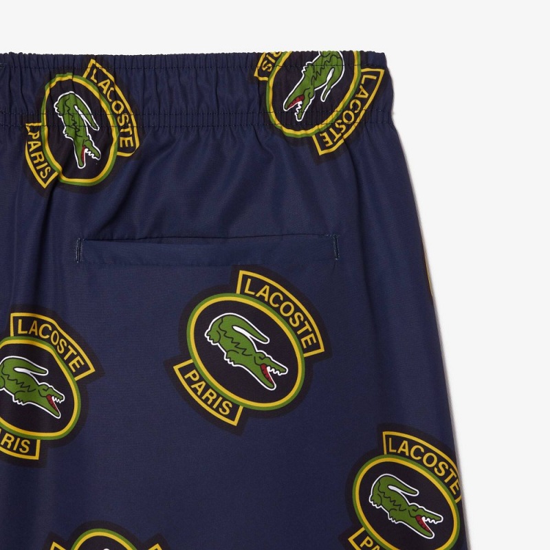 Men's Lacoste Logo Badge Swim Trunks Navy Blue Yellow | QGW871042