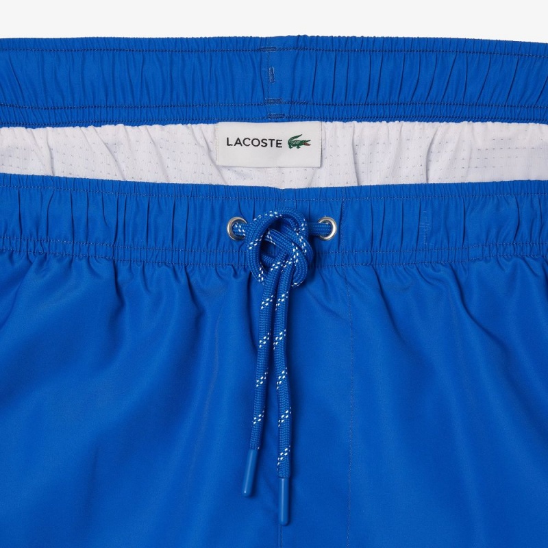 Men's Lacoste Logo Printed Swim Trunks Blue White | IHZ825673