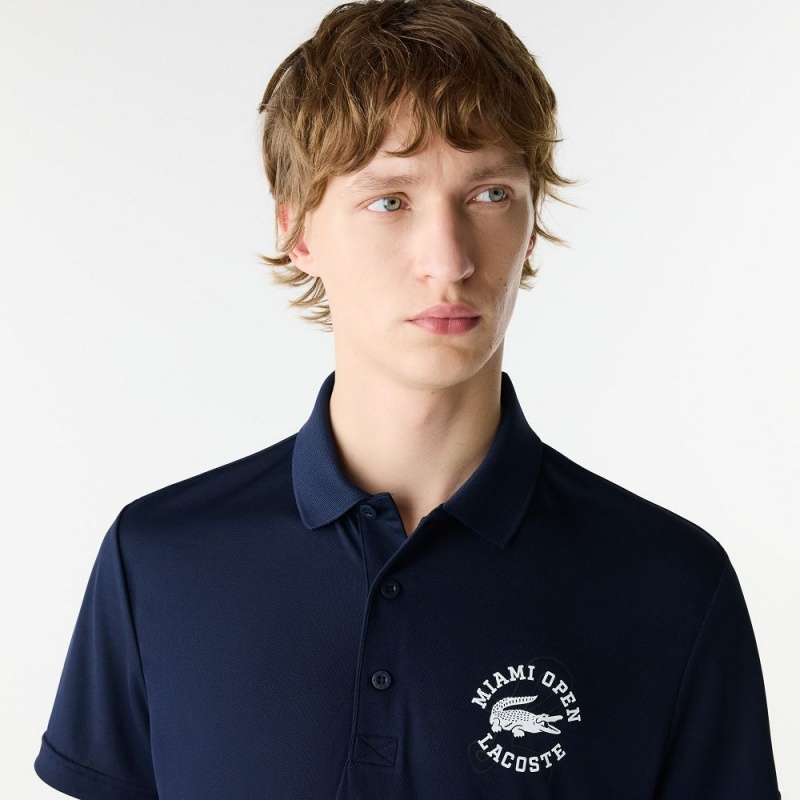 Men's Lacoste Miami Open Edition Ultra-Dry Piqué Polo Shirts Navy Blue | BTS659217