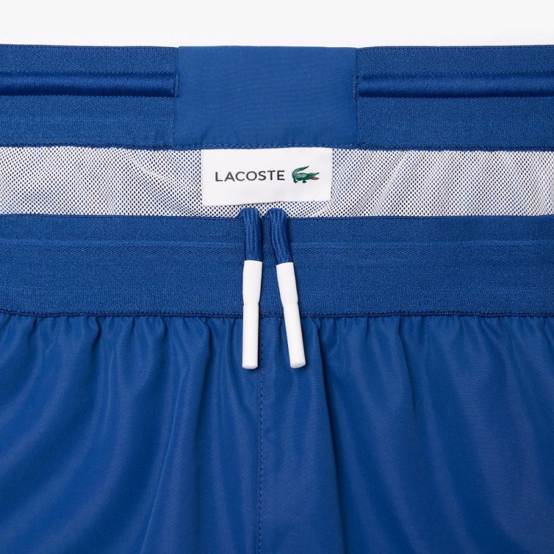 Men's Lacoste Mid Length Colorblock Striped Swim Trunks Blue White | ALZ976314