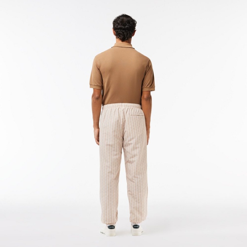 Men's Lacoste Monogram Print Sweatpants Beige White | BLU106749