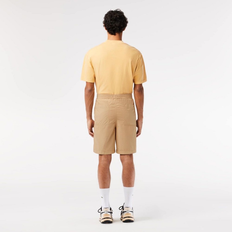 Men's Lacoste Relaxed Fit Washed Effect Elastic Bermuda Shorts Beige | NCL621095