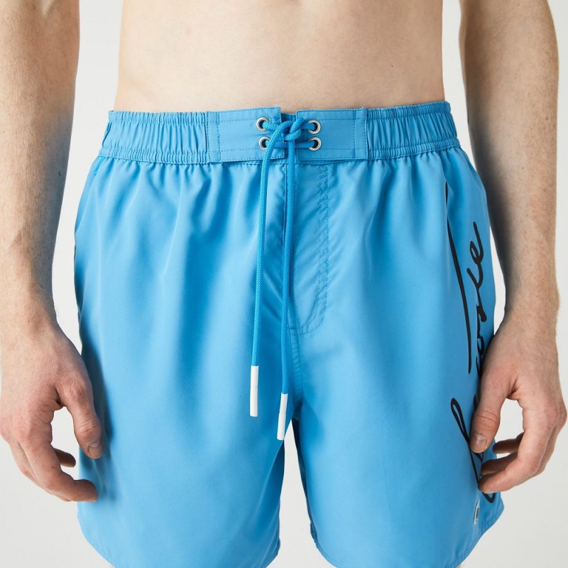 Men's Lacoste Signature Print Light Swim Trunks Blue | DTY904823