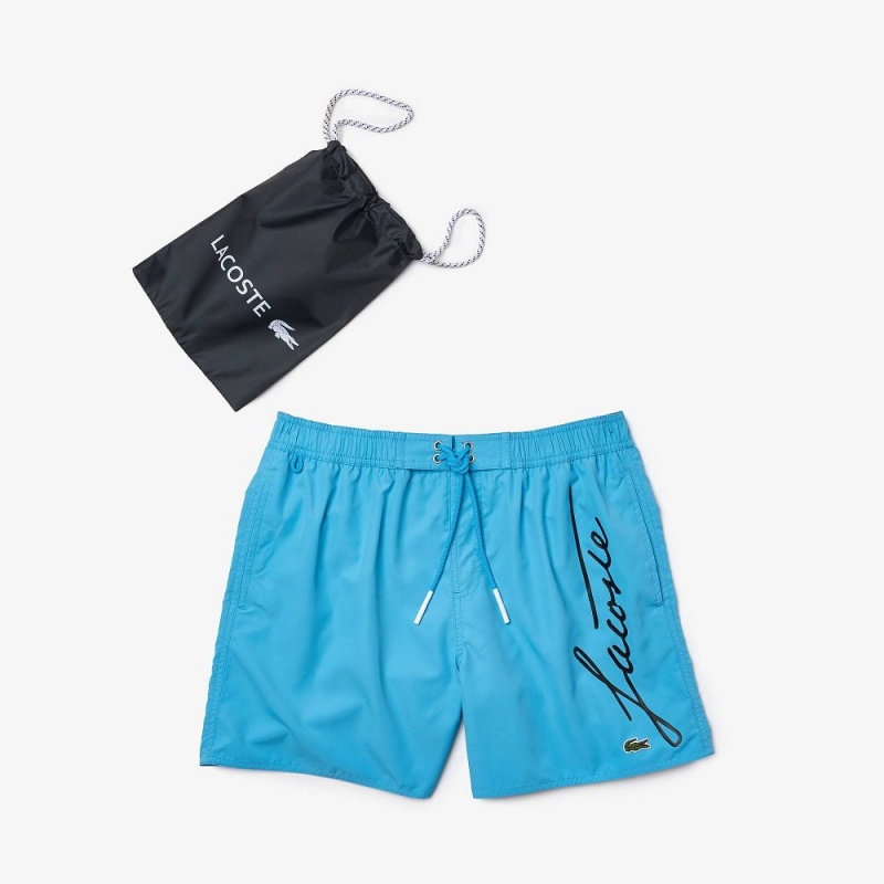 Men's Lacoste Signature Print Light Swim Trunks Blue | DTY904823